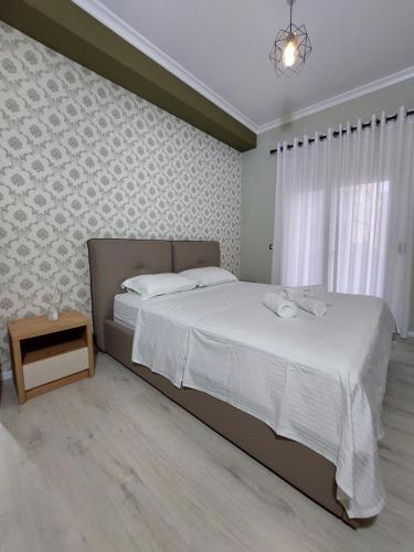 Postelja oz. postelje v sobi nastanitve Vila Tafa apartments ap3