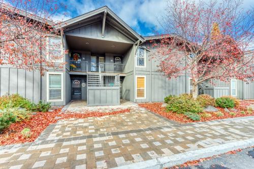 a house with a driveway in front of it at Sun River Retreat in Sunriver