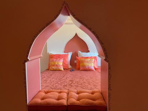 a room with a couch in the middle of a room at Chambres d'Hotes Raviere in Bouhy
