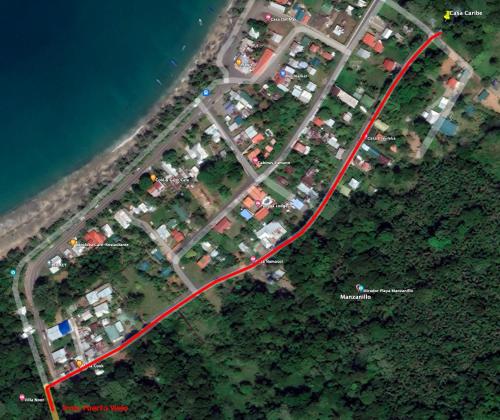 an aerial view of a parking lot with a red line at Private Villa on 2-Acres of Jungle Garden & Pool in Manzanillo