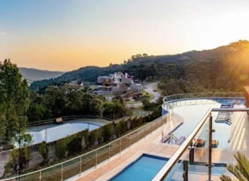 a view of a swimming pool on a house at Golden Gramado Resort Laghetto in Gramado