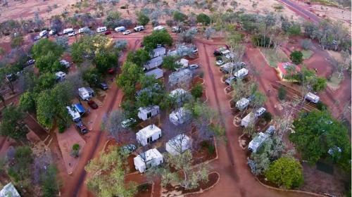an aerial view of a campground with parked cars at Outback Caravan Park Tennant Creek in Tennant Creek