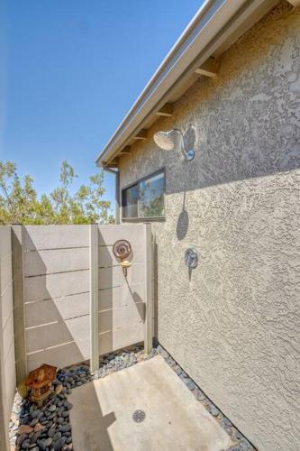 a shower in the side of a house at Desert Dusk in Joshua Tree