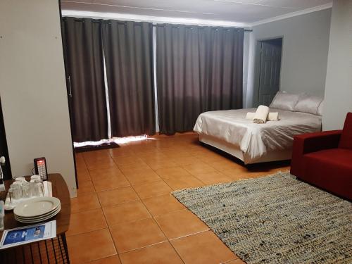 Katil atau katil-katil dalam bilik di STORGE LODGE AND EVENTS VENUE