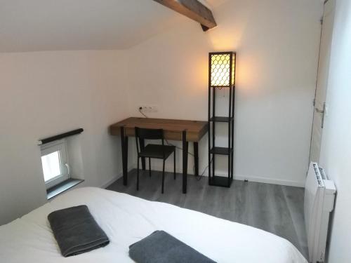 Photo de la galerie de l'établissement Détente - Appartement et poutres apparentes, à Béziers