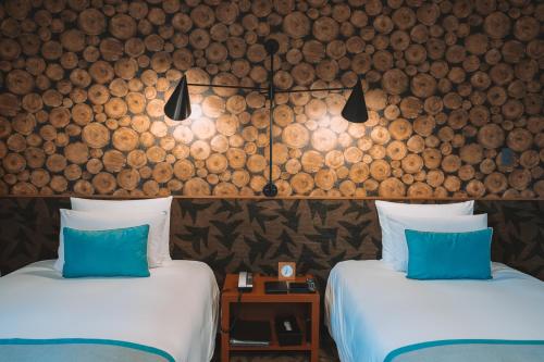 Postel nebo postele na pokoji v ubytování Karuizawa Prince Hotel East