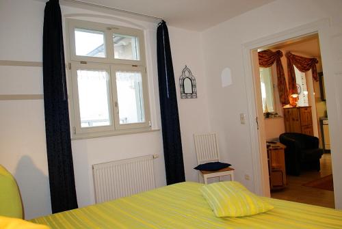 Ένα ή περισσότερα κρεβάτια σε δωμάτιο στο Haus-Bellevue-Appartement-10