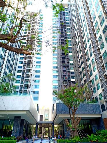 a view of a building with tall buildings at The Base Horizon Central Pattaya in Pattaya