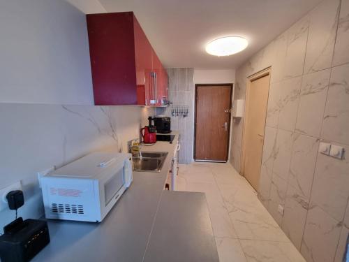 Η κουζίνα ή μικρή κουζίνα στο le 20