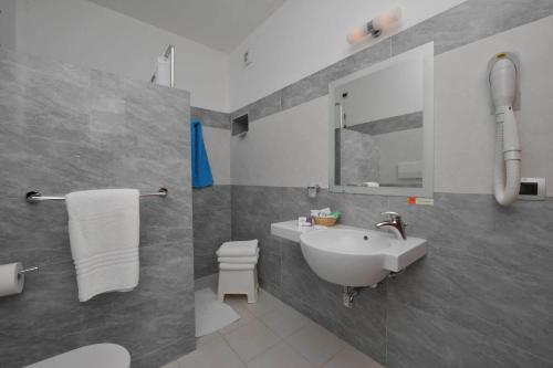 Koupelna v ubytování Hotel Club Koiné