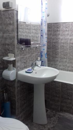 Koupelna v ubytování Apartament 2 camere Blaj Str Avram Iancu Bl 9