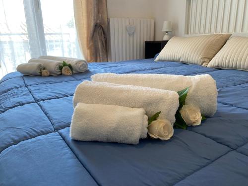 En eller flere senge i et værelse på Via Bovio Guest House