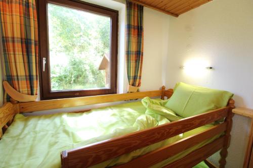 Una cama o camas en una habitación de STAUDACH - apartment near the ski slopes