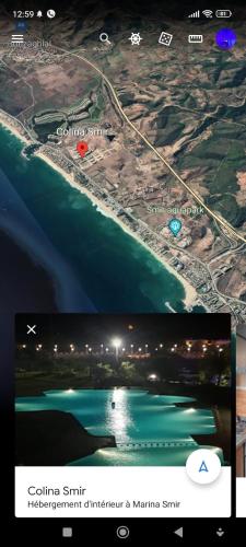 a television screen with a map of a beach at Superbe appart 3pieces a sania plage MARINA SMIR in M'diq