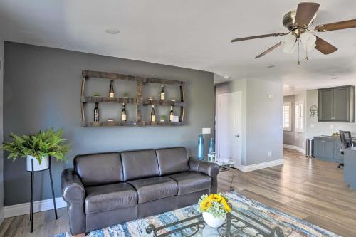 a living room with a couch and a ceiling fan at Hilltop Hideaway in Temecula Wine Country in Sage