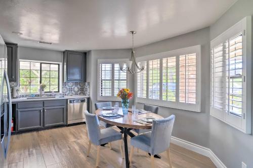 a kitchen with a dining room table and chairs at Hilltop Hideaway in Temecula Wine Country in Sage