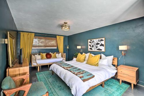 a bedroom with a large bed and a couch at San Diego Gem with Private Hot Tub, Close to Dtwn! in San Diego