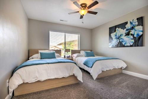 a bedroom with two beds and a ceiling fan at Scenic La Verkin Home 20 Mi to Zion National Park in La Verkin