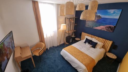 a bedroom with a bed and a large painting on the wall at Charlie's Hôtel Cannes in Cannes