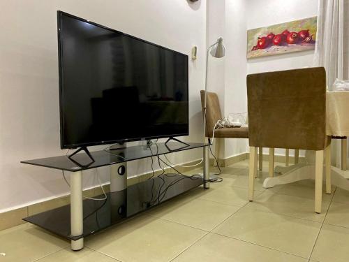 TV a/nebo společenská místnost v ubytování Venir