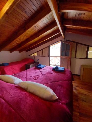 Кровать или кровати в номере Casa La Encantada, en el pedemonte mendocino