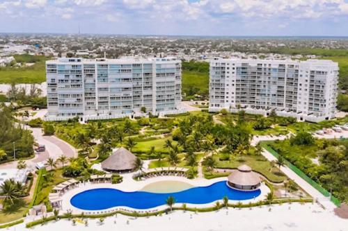 an aerial view of a resort at REEF Beachfront 3BDR apartment by CASA PARAISO in Cancún