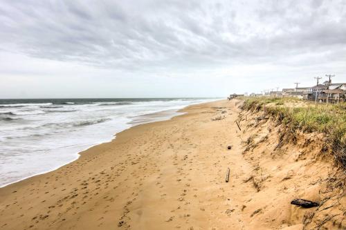 a sandy beach with a view of the ocean at Kitty Hawk Townhome at Sea Dunes - Walk to Beach! in Kitty Hawk