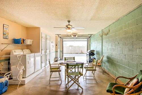 a room with a table and chairs in a room at Kitty Hawk Townhome at Sea Dunes - Walk to Beach! in Kitty Hawk