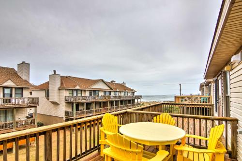 a patio with a table and chairs on a balcony at Kitty Hawk Townhome at Sea Dunes - Walk to Beach! in Kitty Hawk