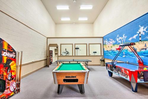 a billiard room with two tables and a pool at Kitty Hawk Townhome at Sea Dunes - Walk to Beach! in Kitty Hawk