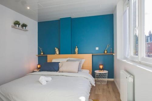 Posteľ alebo postele v izbe v ubytovaní Bel appartement lumineux proche du centre-ville