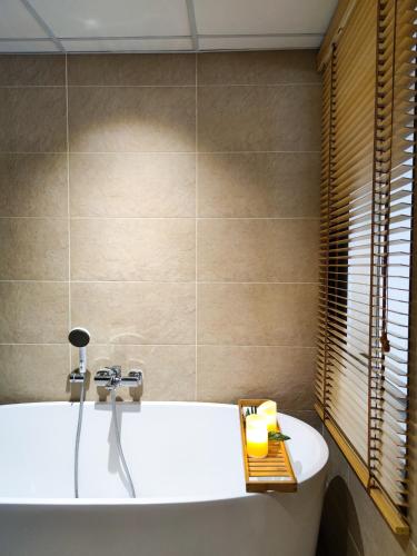 Un baño de Hi Chiangmai Hotel