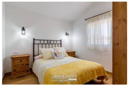 A bed or beds in a room at Villa Montiel