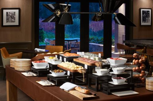 a buffet line with food on a table at The Estate Yountville in Yountville