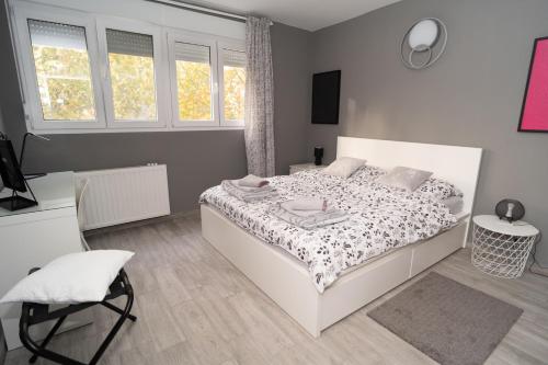 Postel nebo postele na pokoji v ubytování Apartman Ina
