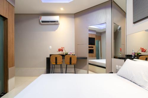 Un ou plusieurs lits dans un hébergement de l'établissement Sfera Motel