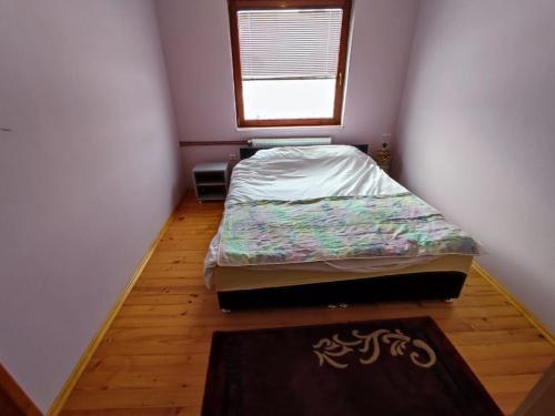 Postel nebo postele na pokoji v ubytování Apartman DG