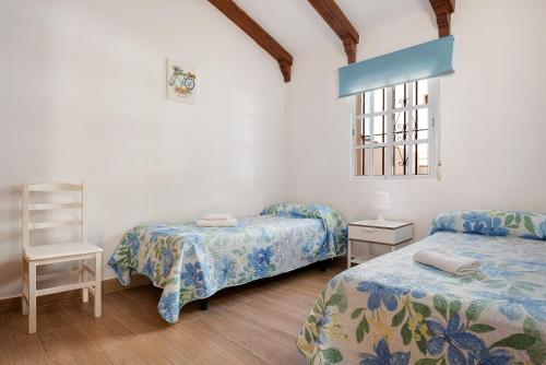 Posteľ alebo postele v izbe v ubytovaní Apartamento en la playa 2