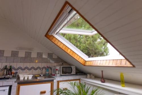 Kuchyňa alebo kuchynka v ubytovaní Studio sous les étoiles au coeur de Jaurès