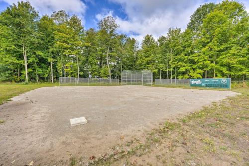an empty baseball field with a sign in the middle at Pet-Friendly Cassopolis Escape with Lake Access in Cassopolis