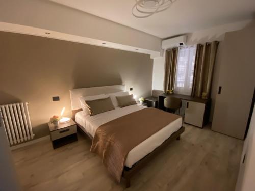 Hotel Plaza Ungheriaにあるベッド