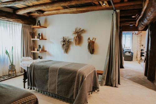 Postel nebo postele na pokoji v ubytování Aldea Kuká, Luxury Eco Boutique Hotel