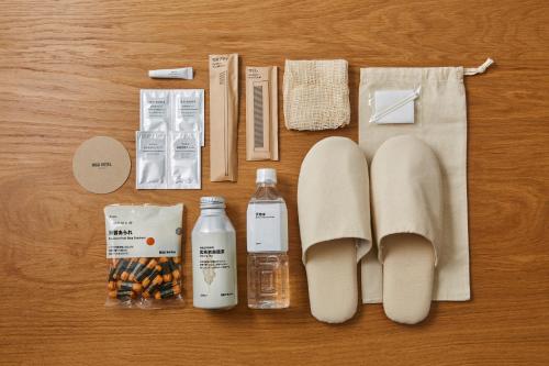 a group of products are laid out on a table at MUJI HOTEL GINZA in Tokyo