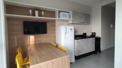 Η κουζίνα ή μικρή κουζίνα στο Residencial Brisa térreo