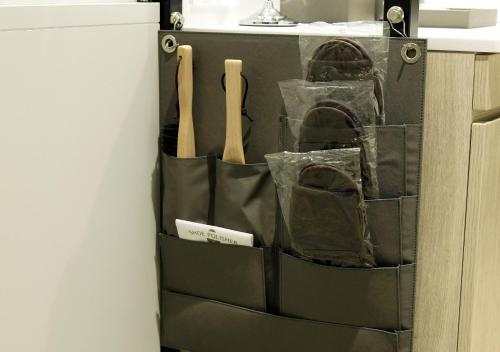 a black bag with cooking utensils in a kitchen at Oriental Hotel Fukuoka Hakata Station in Fukuoka