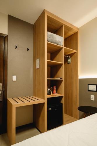 Postel nebo postele na pokoji v ubytování Malbec Casa Hotel