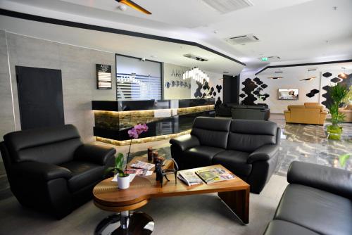 Χώρος καθιστικού στο Arus Hotel