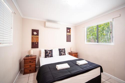 Cama o camas de una habitación en Hidden Valley Holiday Park Darwin