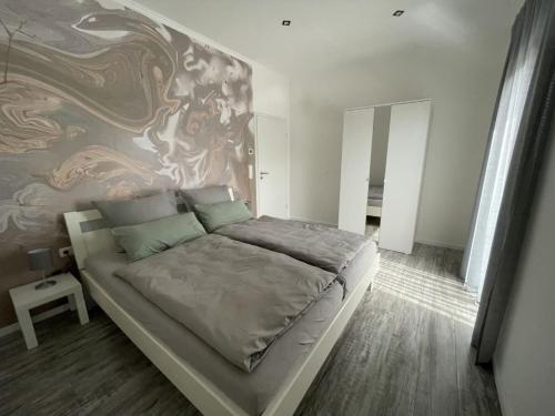 Postel nebo postele na pokoji v ubytování Lenas Ferienhaus