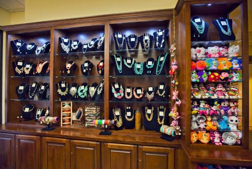 a cabinet filled with lots of shoes and christmas decorations at Music Road Resort Hotel and Inn in Pigeon Forge